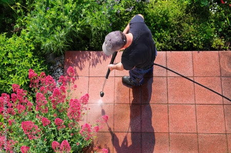 The Exterior Group technicians taking care while cleaning exterior windows. 